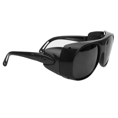 Black welding welder goggles with protective lenses for gas argon arc welding and soldering safety, protecting eyes during work.