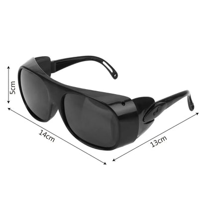 Black welding welder goggles with adjustable strap, protective glasses for gas argon arc welding and soldering safety.