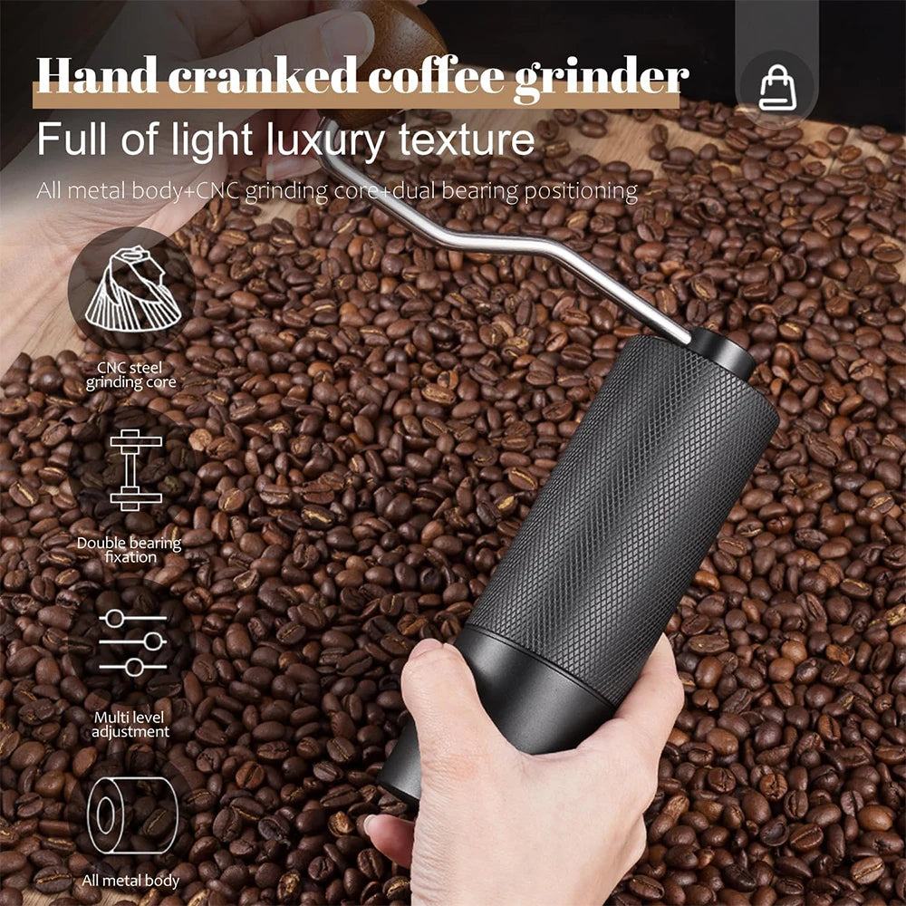 Stainless steel manual coffee grinder with conical burrs, adjustable settings, portable hand design, ideal for fresh coffee brewing.