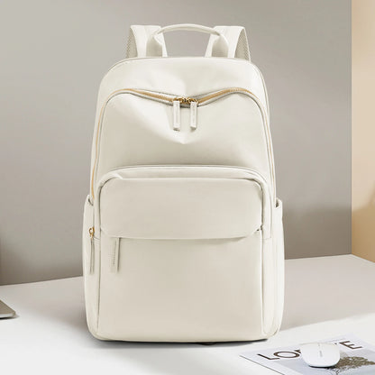 Black women's casual backpack with elegant design, theft-proof features, suitable for work, travel, and carrying a laptop.