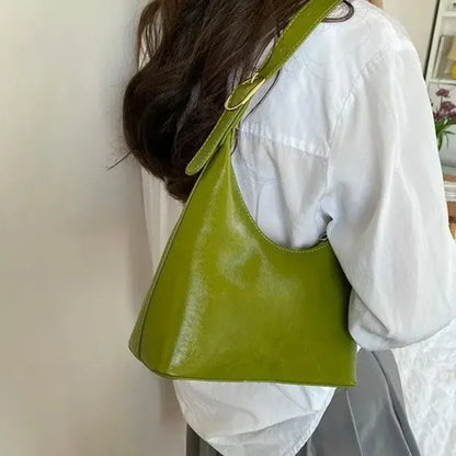 Avocado green women's shoulder handbag with a stylish hobo design, perfect for spring and summer commuting.