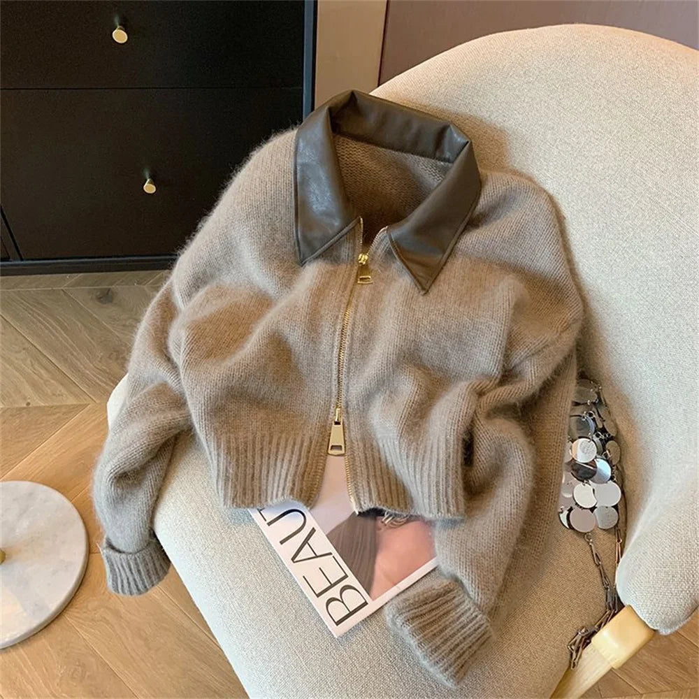 Black women's knitted cardigan sweater with long sleeves, turn collar, loose fit, suitable for autumn winter fashion.