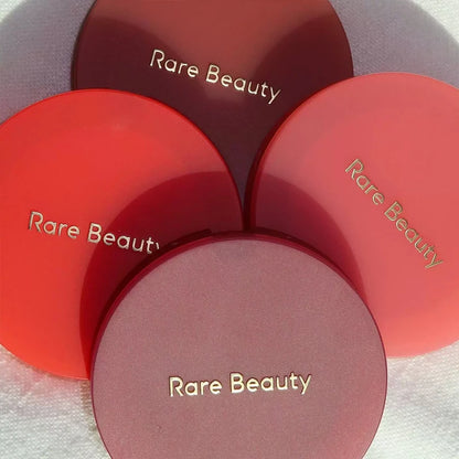 Rare Beauty 3D Face Bronze Contour Stick and Soft Pinch Mashed Potato Liquid Blusher in sleek, compact packaging.
