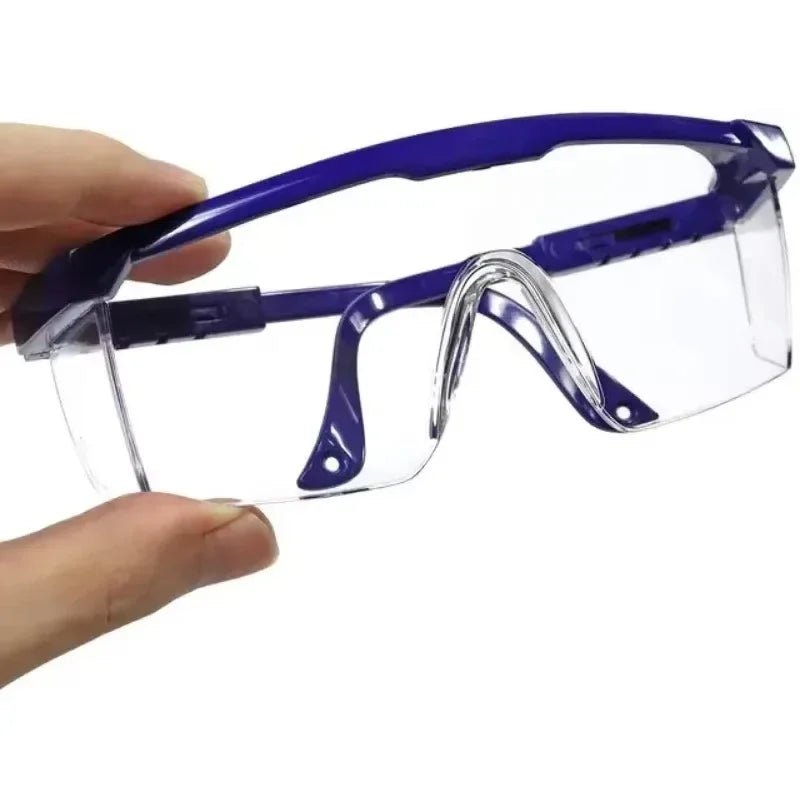 Blue anti-splash safety goggles by BACKUPMYFILESNOW.COM® with wind and dust-proof lenses, ideal for industrial, lab, outdoor, and cycling use.