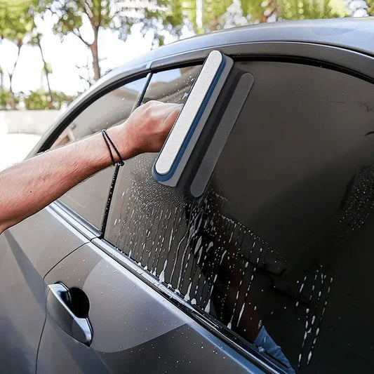 Blue silicone water wiper plate and glass cleaner scraper for car windshield, window, bathroom, and kitchen cleaning.