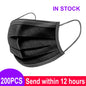 Blue disposable 3-layer surgical face mask, nonwoven material, approved for medical use, shown in a stack of masks.