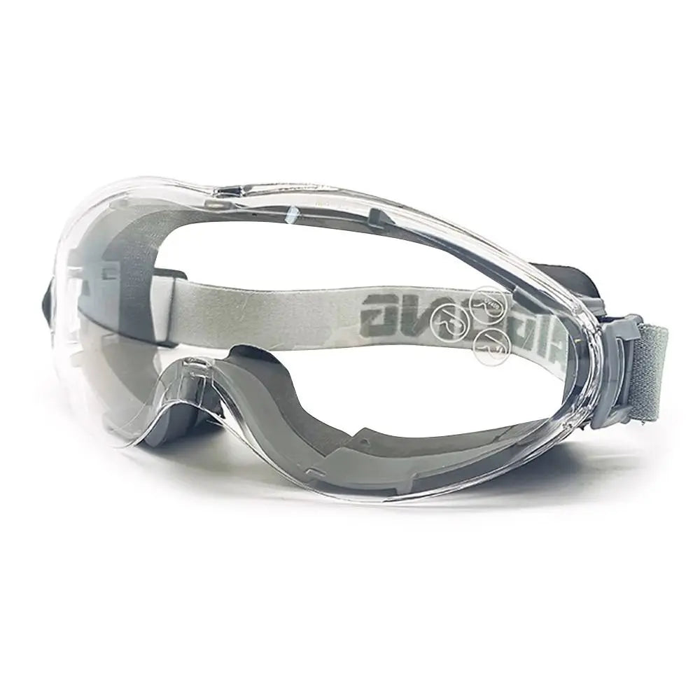 Blue industrial safety goggles with clear anti-fog lenses, designed to fit over glasses for eye protection in lab and industrial settings.