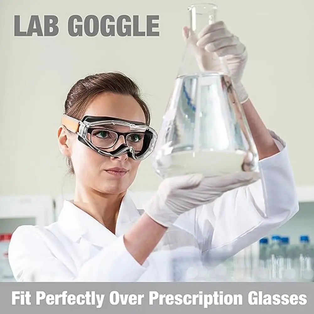 Blue industrial safety goggles with clear anti-fog lenses, fit over glasses, designed for eye protection for men and women.