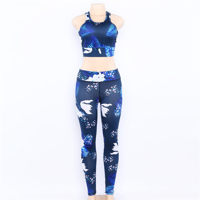 Women's floral print yoga set with supportive bra and matching leggings, stylish athletic outfit for active wear.