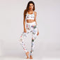 Women’s floral print yoga set with sports bra and leggings from BACKUPMYFILESNOW.COM®, featuring vibrant floral designs.