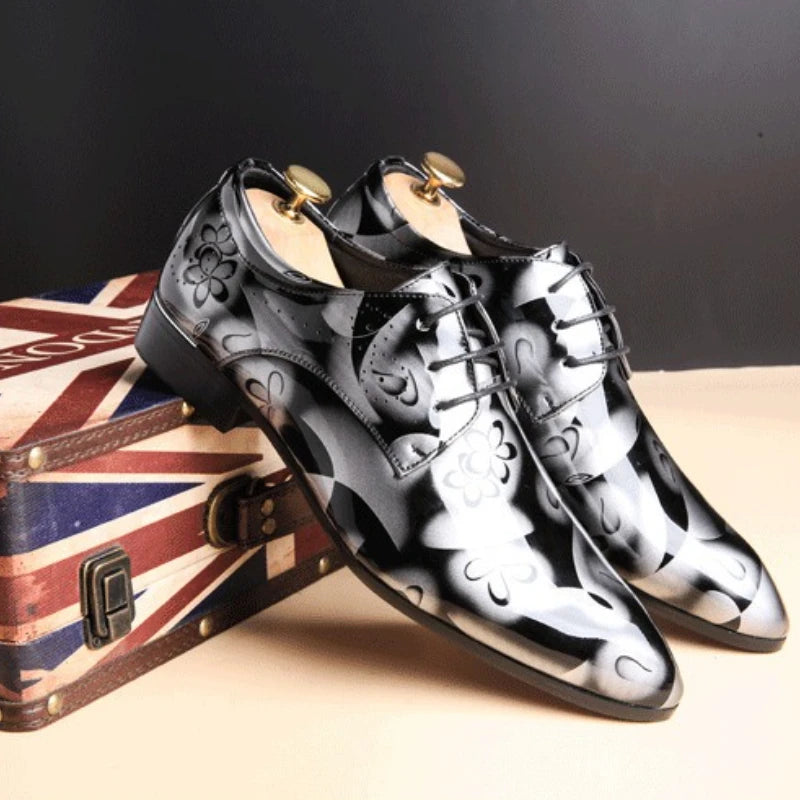 Blue men's patent leather dress shoes with lace-up design, pointed toe, suitable for office, business, or wedding occasions.