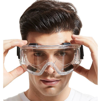 Blue impact-resistant safety goggles by BACKUPMYFILESNOW.COM® with wide view, windproof and anti-dust protection for work and DIY safety.