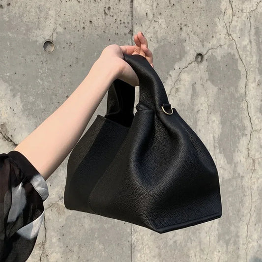 Blue fashionable women's handbag with retro style, high-end design, simple and versatile crossbody bag for everyday use.