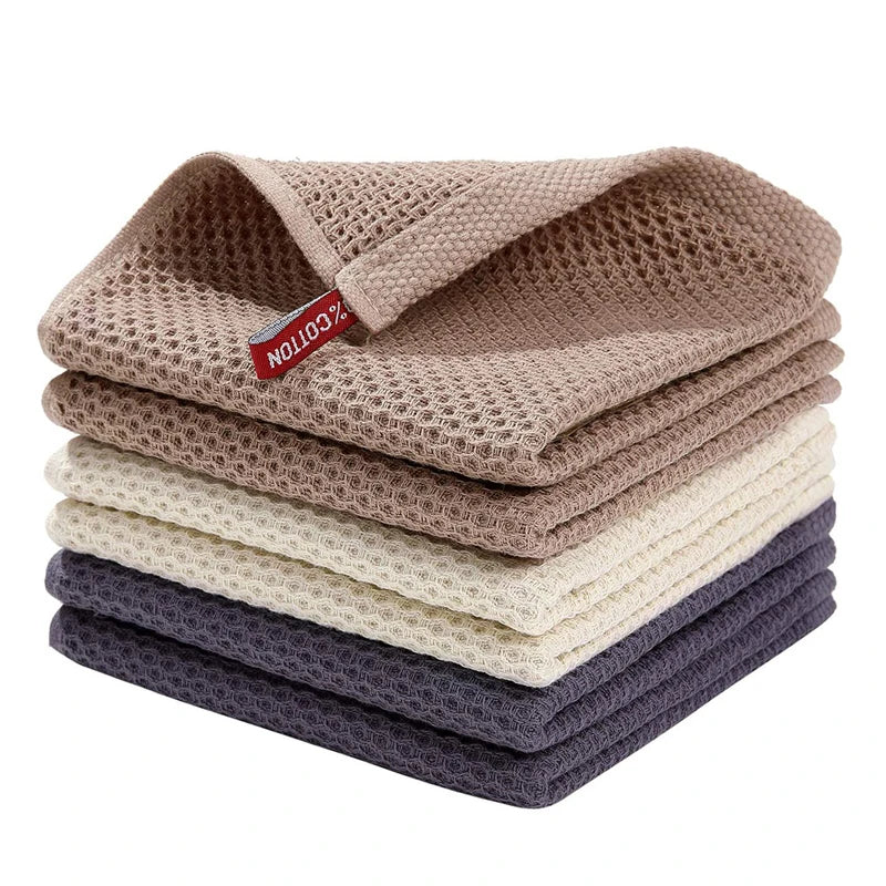 Blue cotton dish towels with honeycomb pattern, soft, absorbent kitchen rags, ideal for cleaning and face washing.