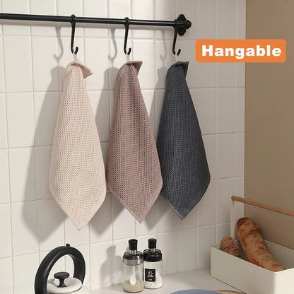 Blue cotton dish towels set with honeycomb texture, soft, absorbent, breathable kitchen cloths for cleaning and face washing.