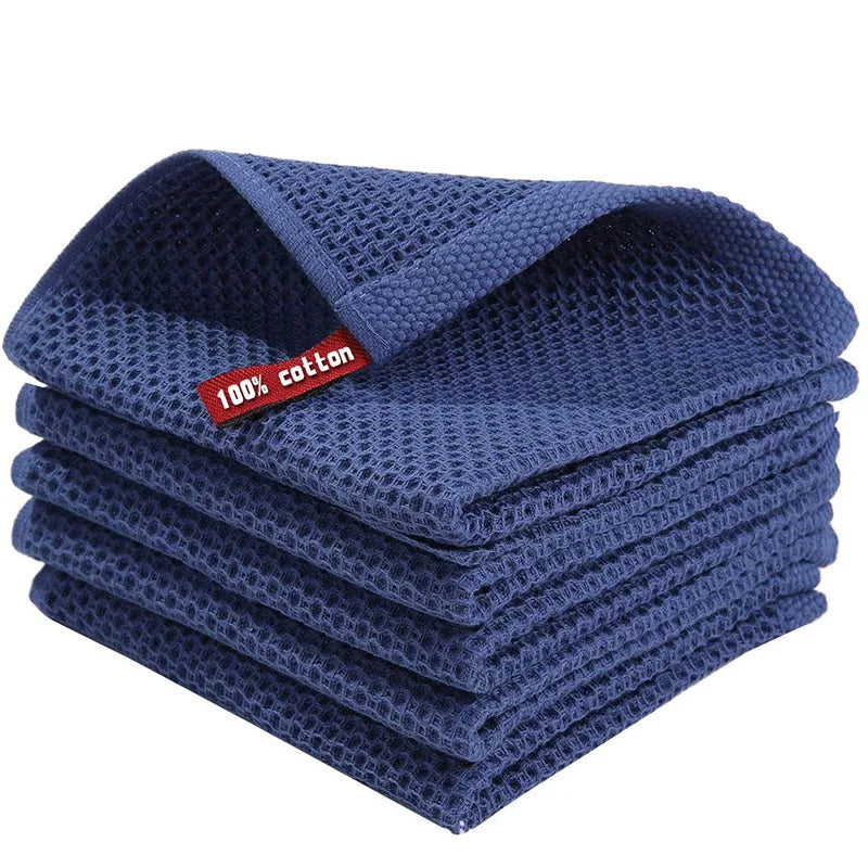 Blue cotton dishcloth set with honeycomb texture, soft and absorbent kitchen towels for cleaning and face washing.