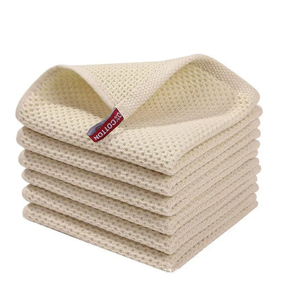 Blue cotton dishcloths with honeycomb texture, soft, absorbent kitchen rags for cleaning, face washing, and household use.
