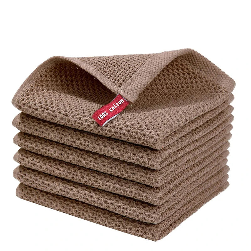 Blue cotton dishcloths with honeycomb texture, soft and absorbent kitchen dish rags for cleaning and face washing.