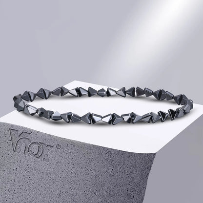 Black triangle beads bracelet for men and women, unisex stretch hematite wristband with handmade design.