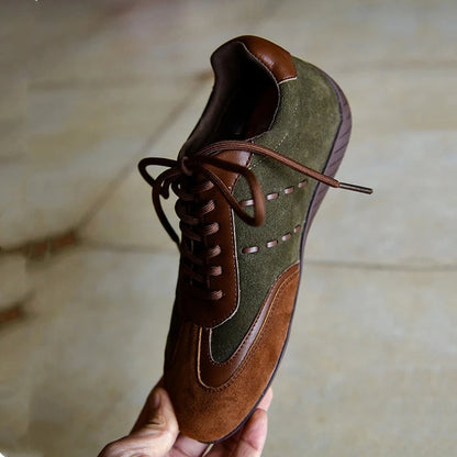 AIYUQI 2026 women's sneakers in genuine leather, brown, with anti-slip sole and retro style, designed for comfort and German training.