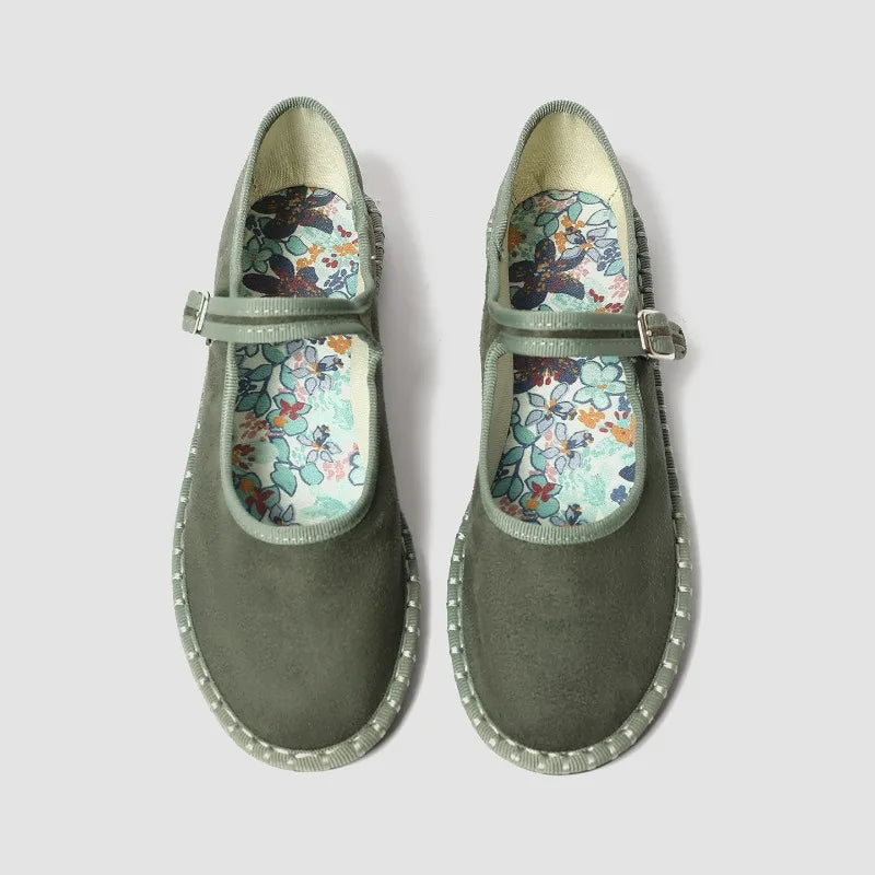 Red velvet Mary Janes shoes for women with printed insoles and stitching, featuring a casual ballet flat design.