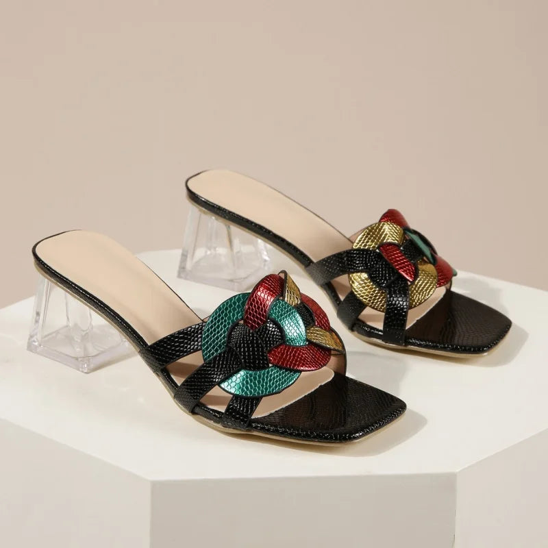 Brown women's summer sandals with square toe, mid-heel, transparent heel, and woven straps, stylish for warm-weather wear.