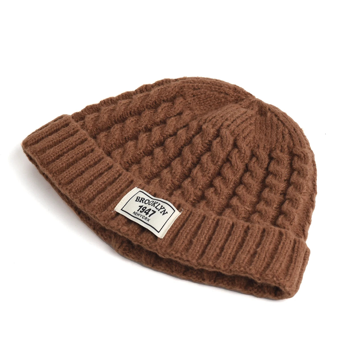 Brown Brooklyn knitted beanie hat for men and women, warm wool cap with simple, trendy style for autumn and winter.