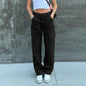 Vintage wide leg denim cargo pants for women, stylish denim trousers with multiple pockets and a relaxed fit.