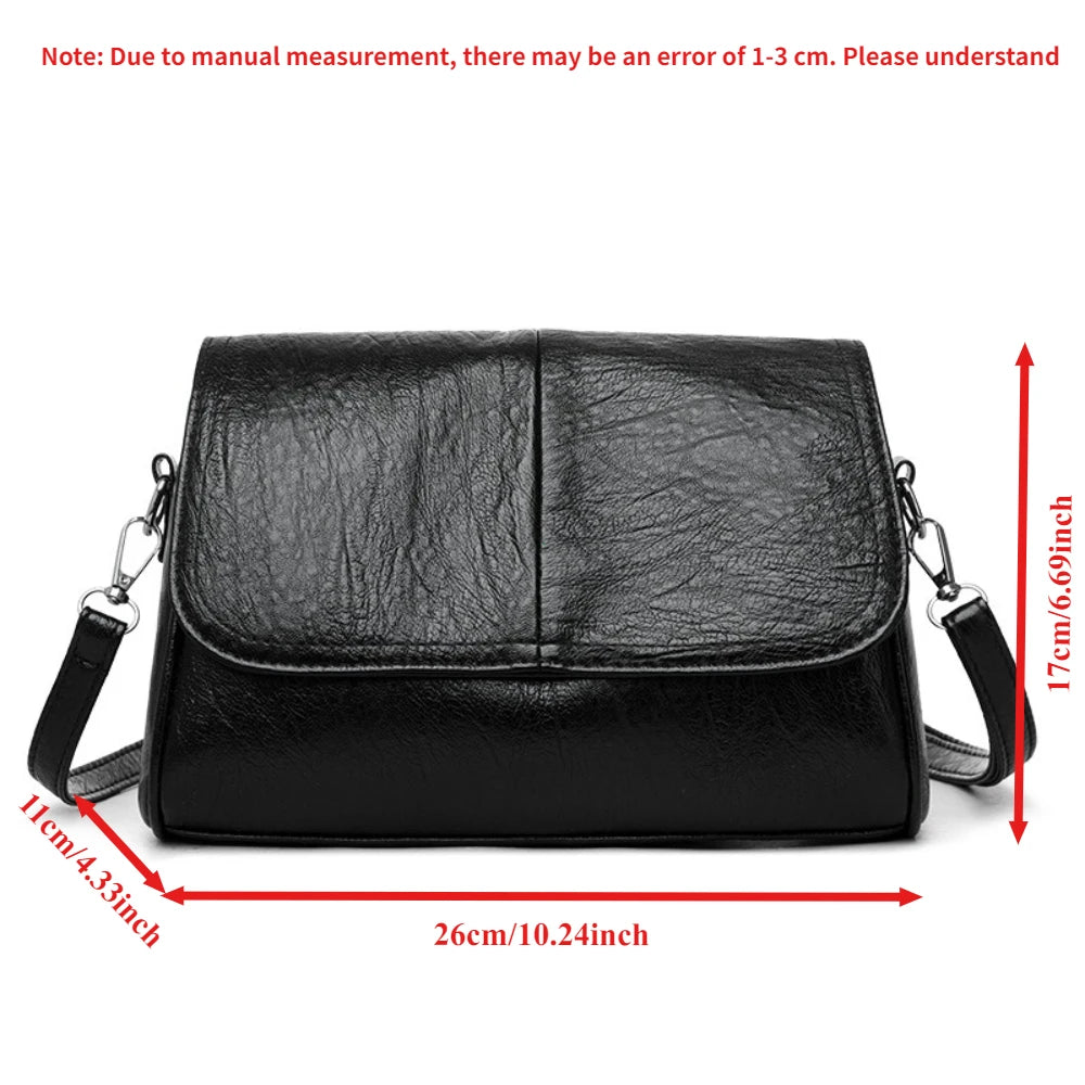 Brown retro oil wax leather crossbody bag with textured vintage feel, elegant flap design, and adjustable shoulder strap.