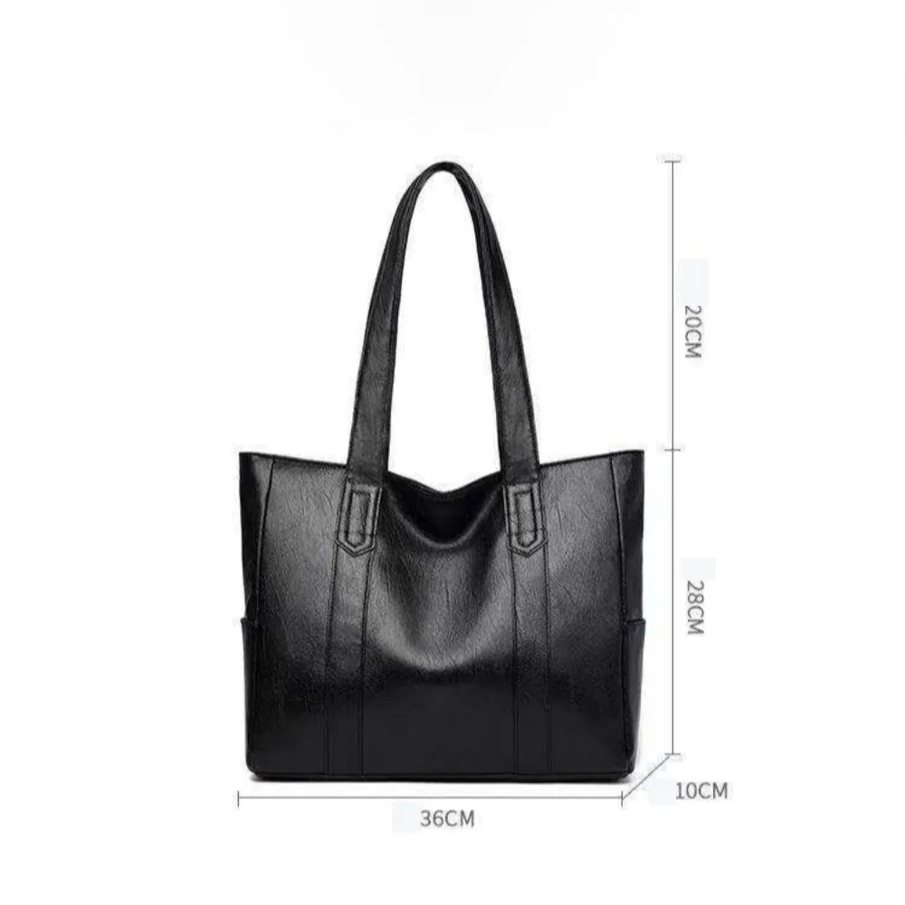 Brown leather tote bag for women, large shoulder handbag with spacious interior and stylish design for everyday use.