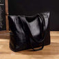 Brown leather tote bag for women, large shoulder handbag with spacious interior, stylish and versatile accessory.