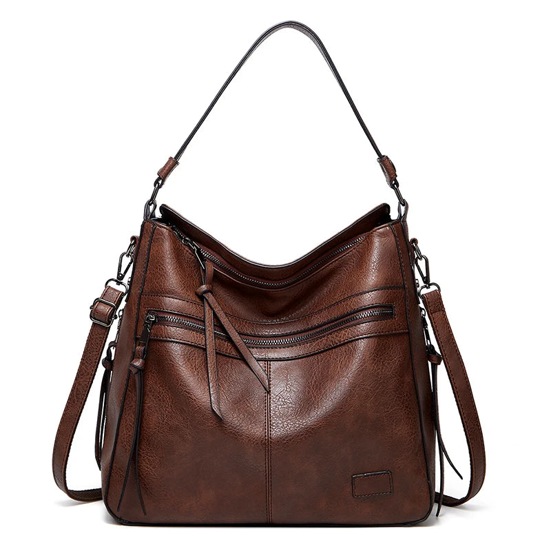 Elegant burgundy women’s leather designer shoulder handbag with large size, suitable for travel, weekend, outdoor, and winter use.