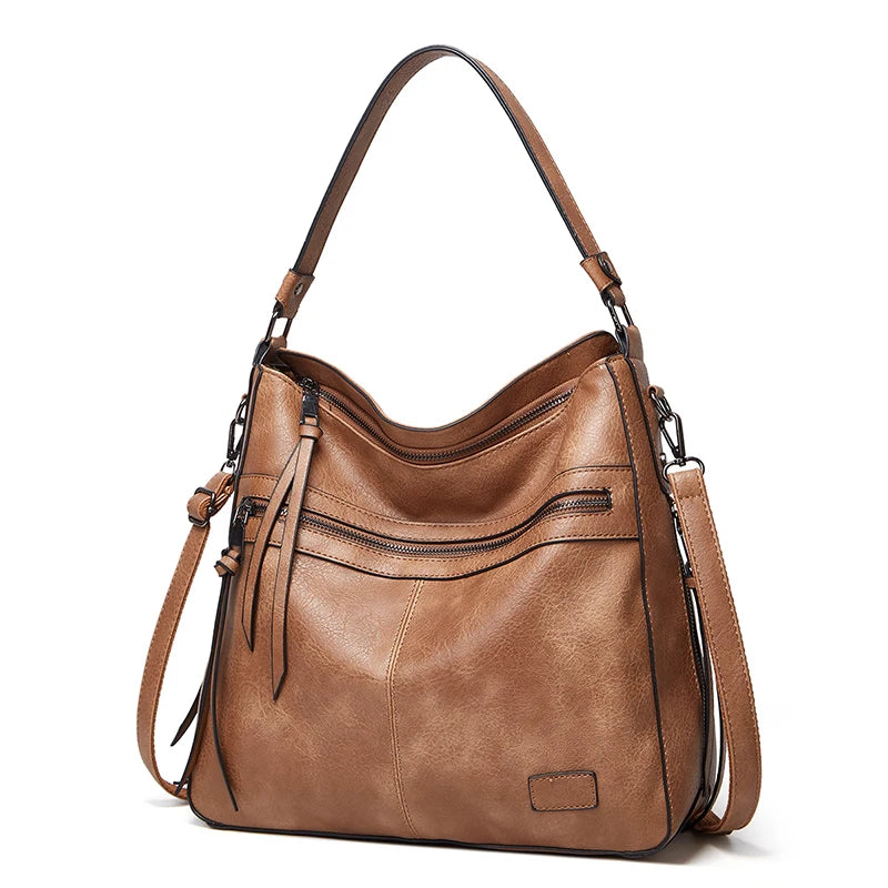 Elegant burgundy women’s designer leather shoulder handbag with large size, perfect for travel, weekend outings, and outdoor use.
