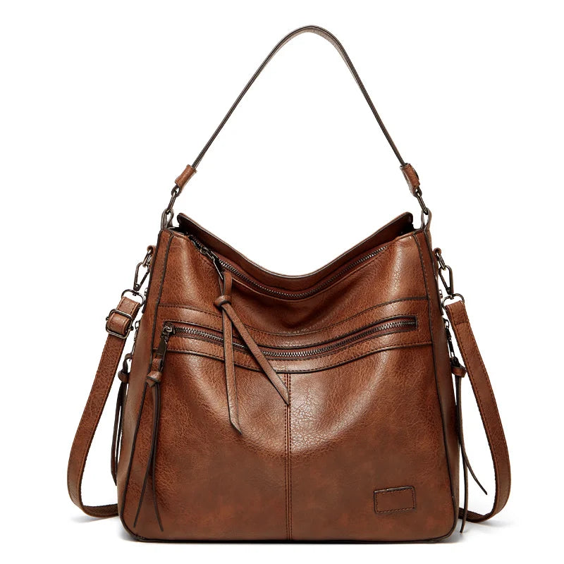 Elegant burgundy leather women's designer shoulder handbag with large size, suitable for travel, outdoor, and winter outings.