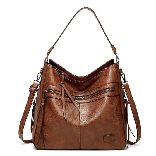 Elegant burgundy leather women's designer shoulder handbag with large size, suitable for travel, outdoor, and winter outings.