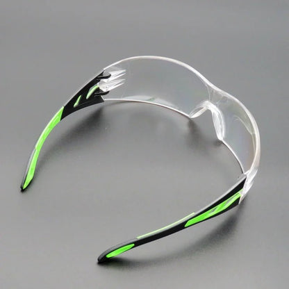 Unisex universal anti-splash safety goggles with clear lens for industrial eye protection, cycling, windproof, and dustproof.