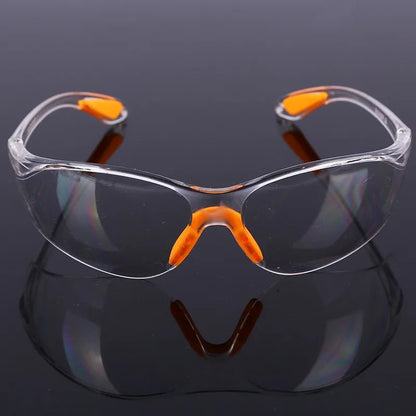 Unisex safety goggles with anti-splash, windproof, and dustproof design for industrial work, cycling, and eye protection.