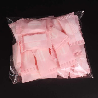 Mini compressed towel capsules from BACKUPMYFILESNOW.COM, portable disposable face and travel wipes in compact capsules.