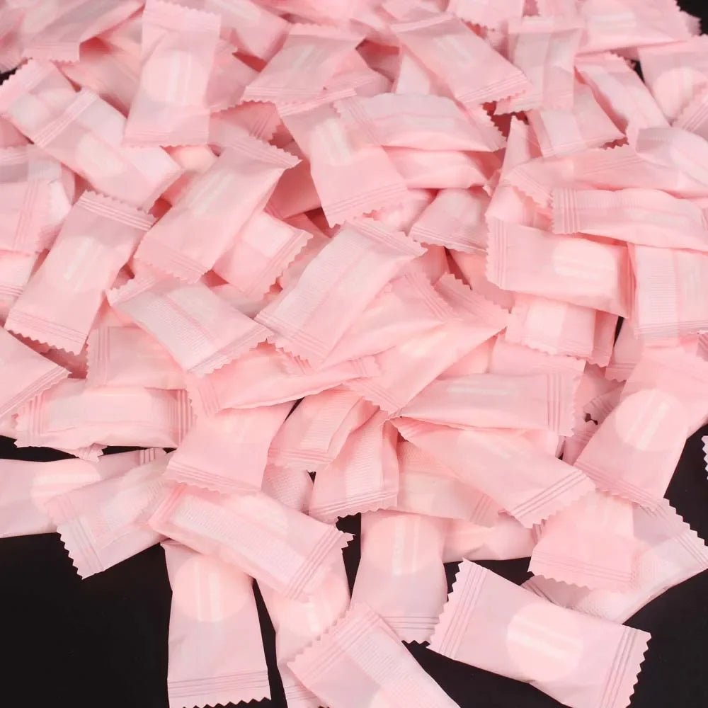Mini compressed towel capsules by BACKUPMYFILESNOW.COM®, portable disposable cloths for face care, travel, outdoor use, and wipes.