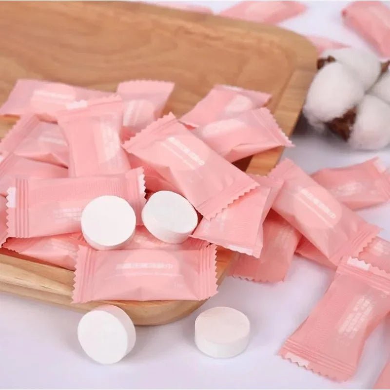 Mini compressed towels in capsules by BACKUPMYFILESNOW.COM®, portable face and travel cloth wipes for outdoor use.