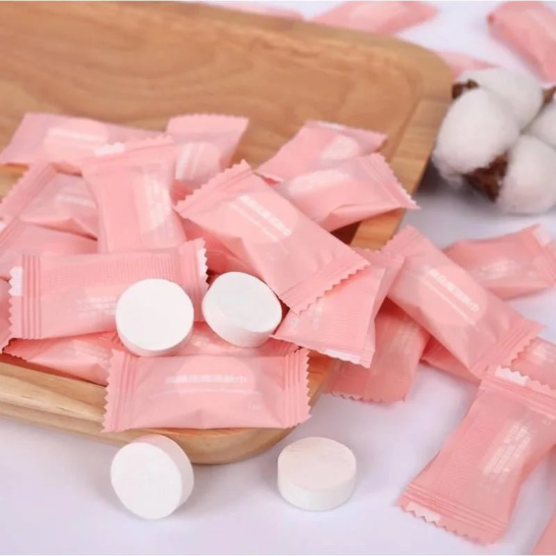 Mini compressed towel capsules by BACKUPMYFILESNOW.COM® for face and travel, including 20, 50, 80, or 100 disposable cloth wipes.
