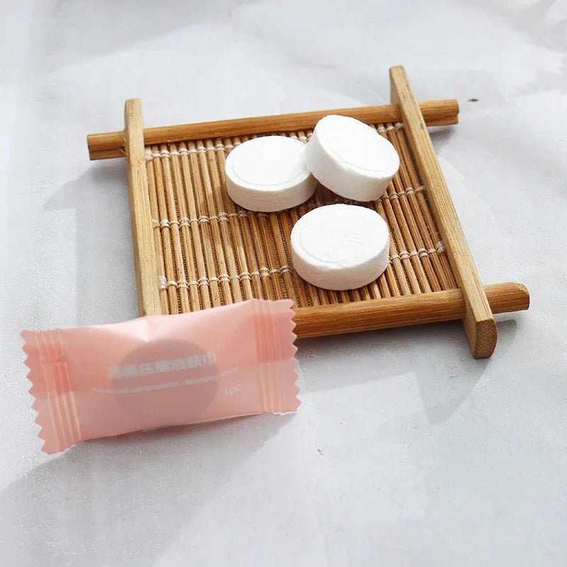 Mini compressed towel capsules by BACKUPMYFILESNOW.COM®, portable disposable cloths for face care, travel, and outdoor use.