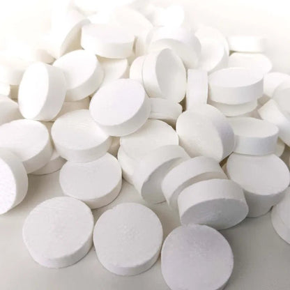 Mini compressed towel capsules by BACKUPMYFILESNOW.COM, disposable travel cloths for face care and outdoor use, paper tissue wipes.