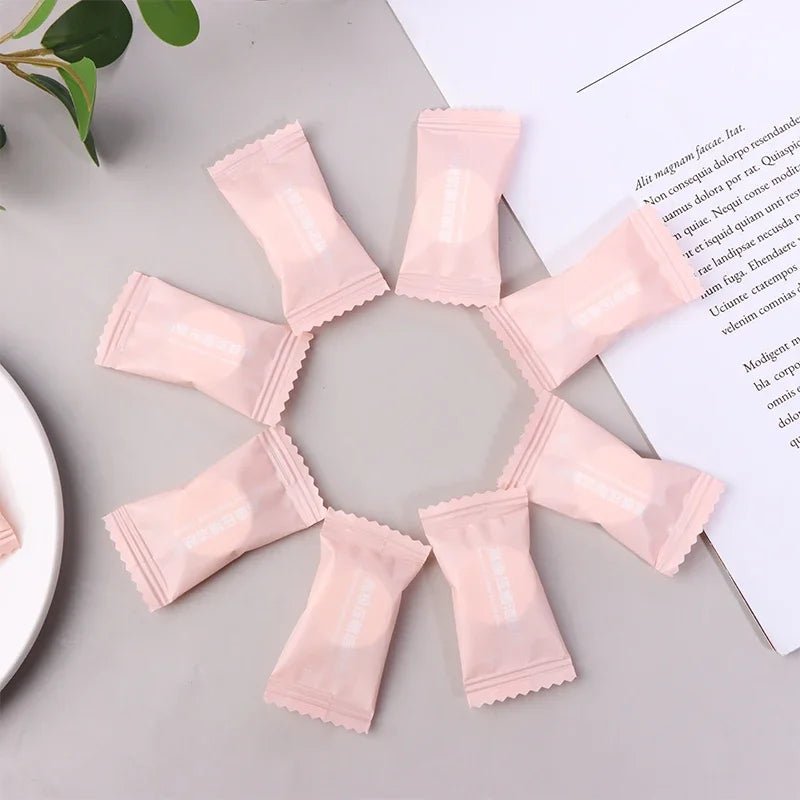 Mini compressed towel capsules by BACKUPMYFILESNOW.COM® in various quantities, compact for outdoor travel and face care use.