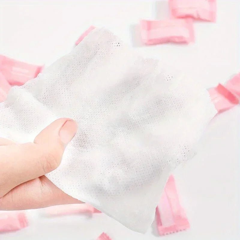 Mini compressed towel capsules from BACKUPMYFILESNOW.COM® in various quantities, compact disposable cloths for face care and travel.