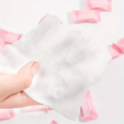 Mini compressed towel capsules from BACKUPMYFILESNOW.COM® in various quantities, compact disposable cloths for face care and travel.