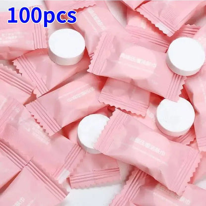 Mini compressed towel capsules from BACKUPMYFILESNOW.COM, disposable cloth wipes for face care, outdoor travel, and quick cleaning.