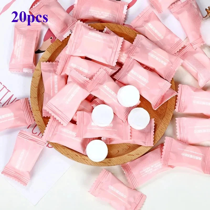 Mini compressed towel capsules in various quantities by BACKUPMYFILESNOW.COM®, ideal for outdoor travel and face care wipes.