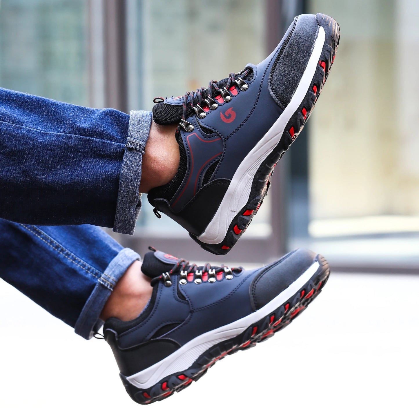 Blue steel toe cap work shoes for men, puncture-proof safety boots with protective sole and secure footwear for industrial work environments.