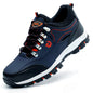 Steel toe cap work boots for men with blue safety shoes, puncture-proof and protective footwear for secure working conditions.